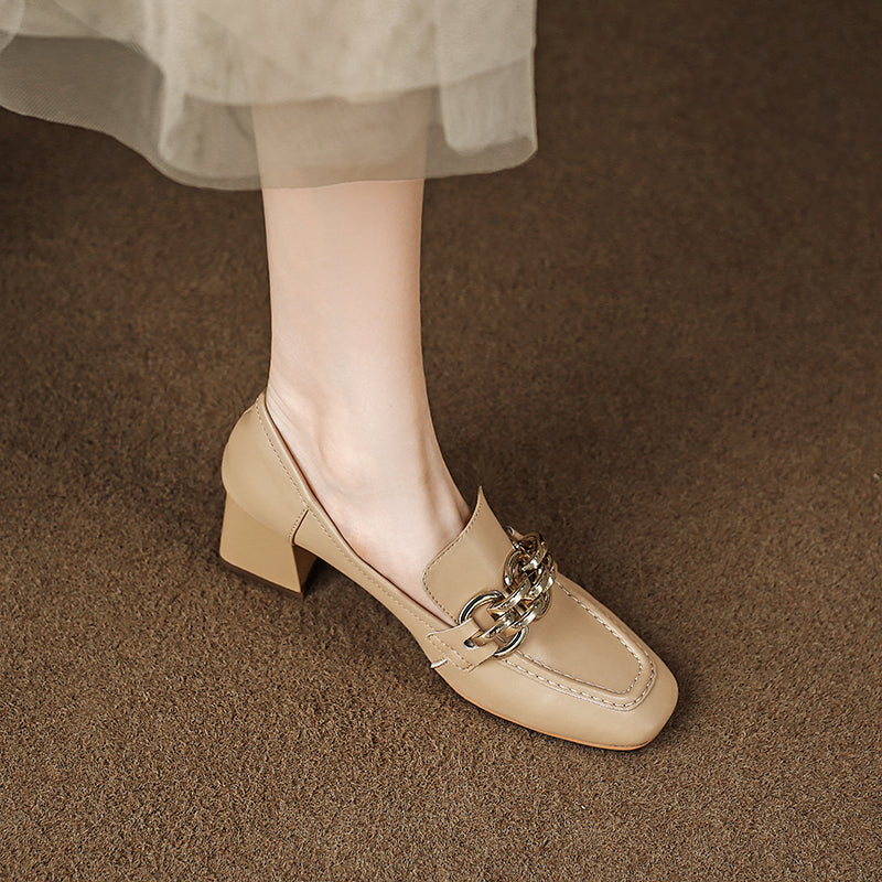 nude heeled loafers with gold chain