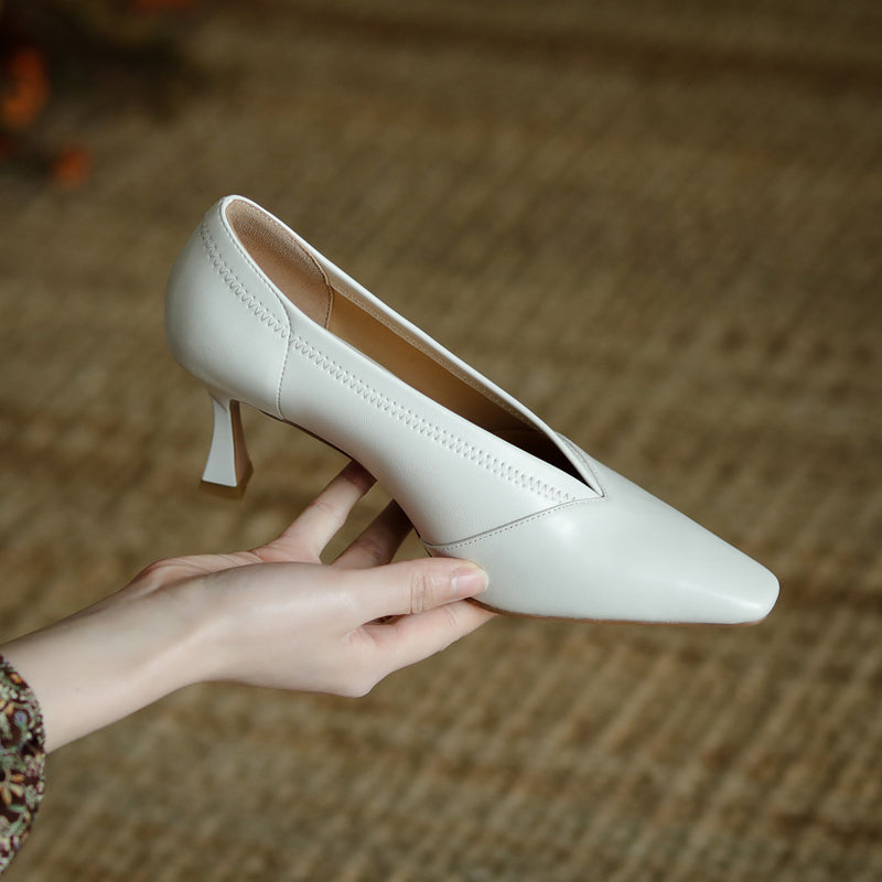 Gwen white pointed toe kitten heels